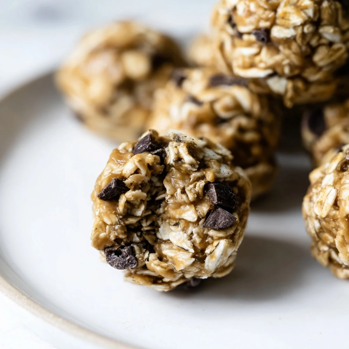 No-bake peanut butter energy balls, speckled with chocolate chips, ready to eat!