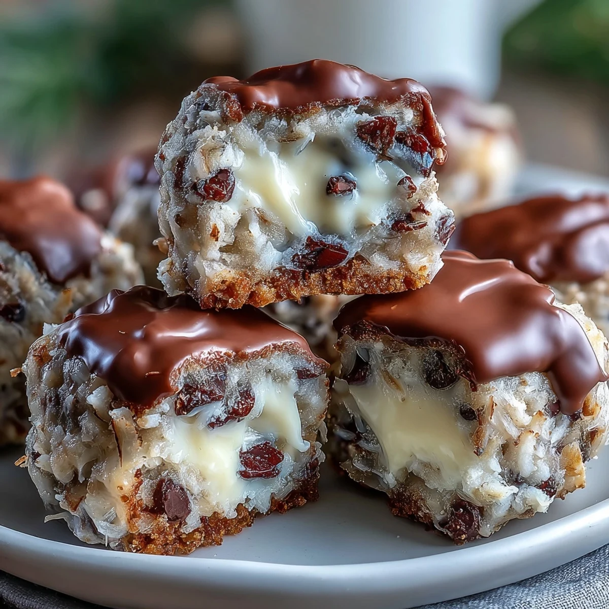Stirred no-bake Moose Bites filled with melted chocolate chips, sweetened condensed milk, and shredded coconut.
