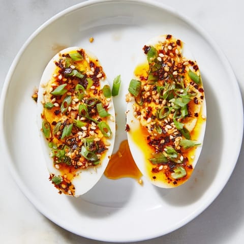 A visually appealing close-up of Chili Oil Eggs, ready to be enjoyed as a flavorful breakfast.