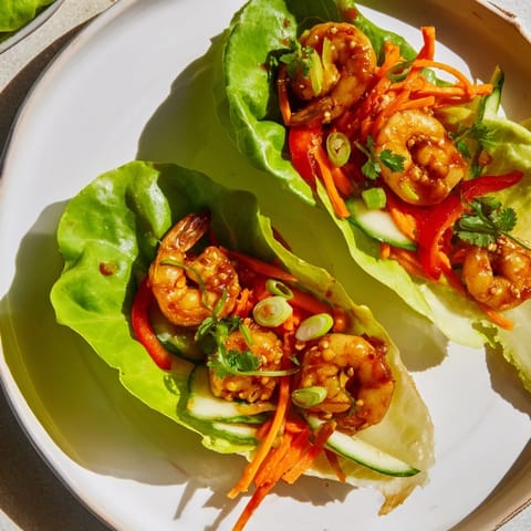 Close-up of delicious shrimp lettuce cups, perfect for a light, healthy Asian-inspired meal.