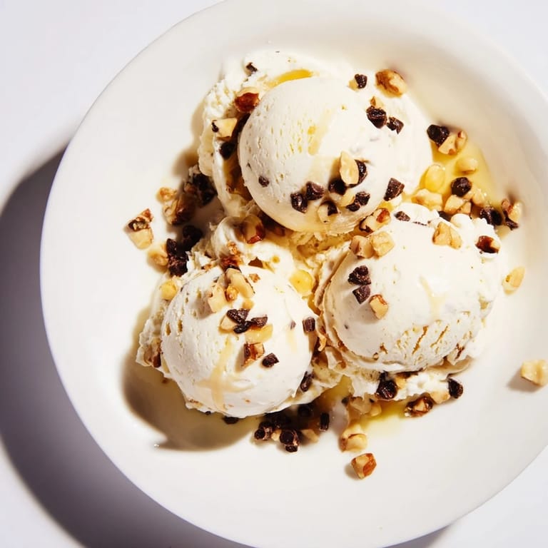 Scooping a spoonful of homemade cottage cheese ice cream, perfectly frozen and delightfully tangy.